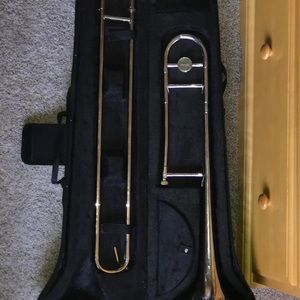 trombone with 2 books